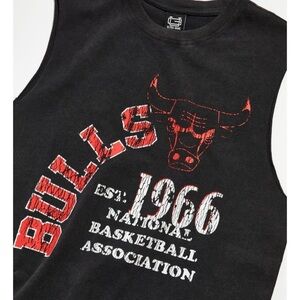 SOLD - Muscle tee topped with a Chicago Bulls graphic.